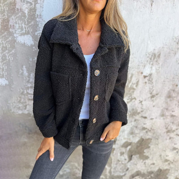Verolyn soft faux fur button jacket in black